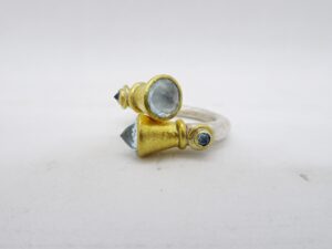Poppy Dandiya aquamarine crossover ring